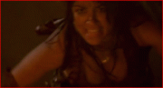 Karen Shenaz David - sweaty cleavage, taut stomach and a token crotch shot - from SCORPION KING 2:  Rise of a Warrior